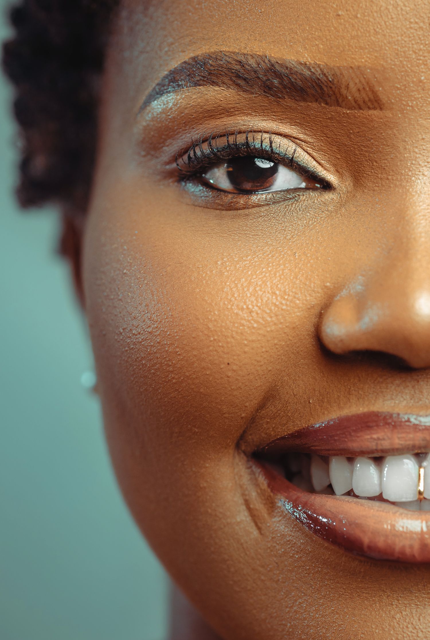 A happy patient with a bright smile at De Santi Dental
