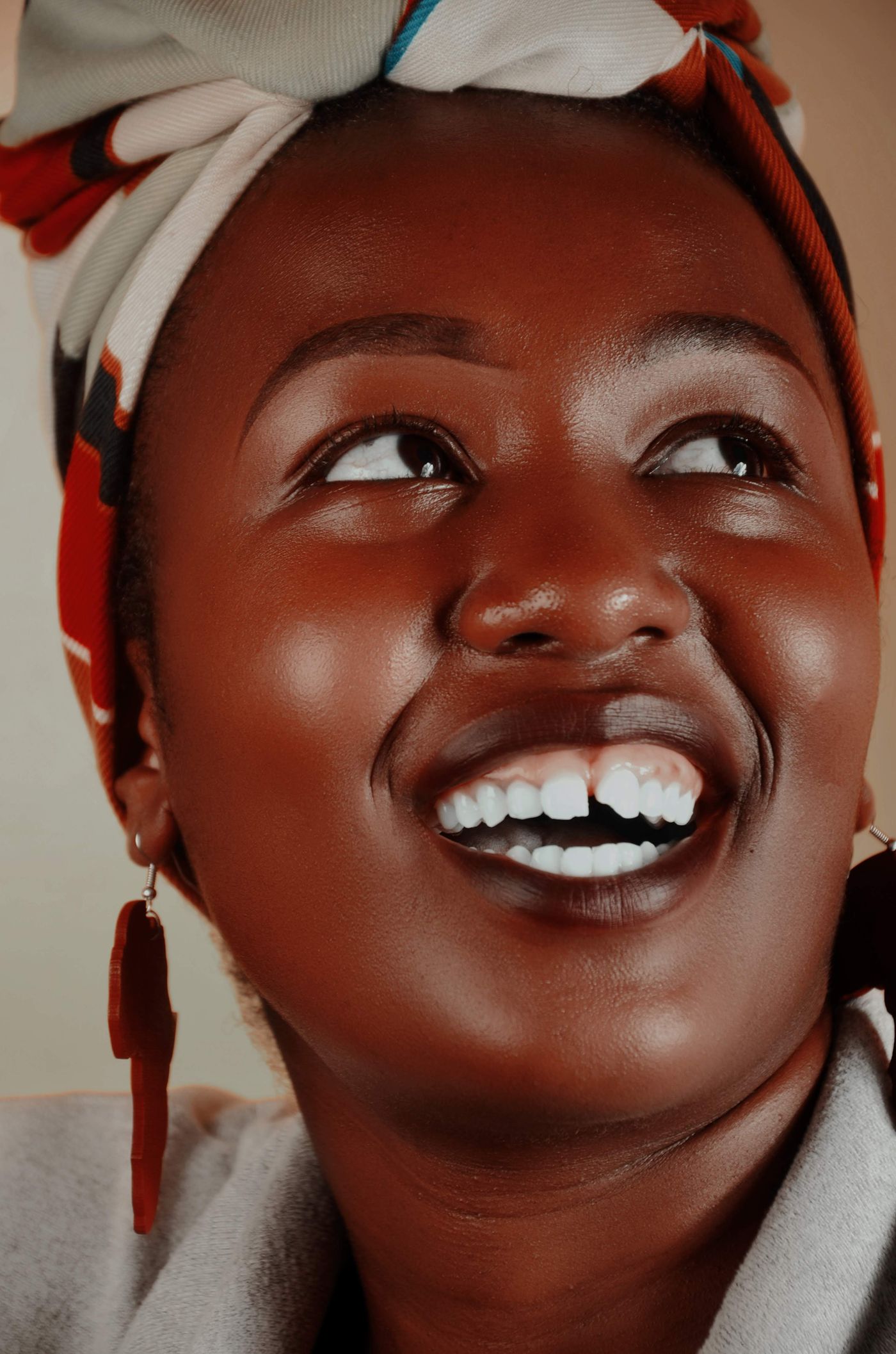 A patient smiling confidently after cosmetic treatment